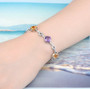 green fluorite citrine amethyst and white zircon bracelet in rhodium over sterling silver worn on a wrist