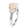 side view of ethiopian opal and zircon three stone ring in rhodium over sterling silver