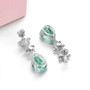 green fluorite peridot and white zircon dangle earrings in rhodium over sterling silver
