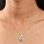 yellow zircon and lab diamond oval halo pendant necklace in 10k yellow gold worn around the neck