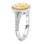side view of oval yellow and white diamond ring in 14k white and yellow gold