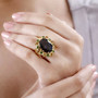 chocolate sapphire citrine and chrome diopside halo cocktail ring in 18k yellow gold over sterling silver worn on a hand