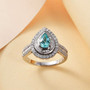 paraiba tourmaline and diamond pear double halo ring in 950 platinum shown in a lifestyle photo
