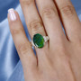 ammolite and diamond ring in 10k yellow gold worn on a hand