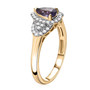 side view of purple sapphire and diamond pear halo ring in 10k yellow gold