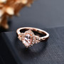 morganite and white zircon halo ring in 18k rose gold over sterling silver shown in a lifestyle photo
