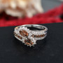 andalusite and white zircon bypass ring in rhodium over sterling silver shown in a lifestyle photo