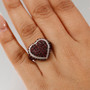 anthill garnet and zircon heart cluster ring in rhodium over sterling silver worn on a hand