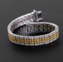 yellow sapphire and moissanite bracelet in rhodium over sterling silver shown in a lifestyle photo