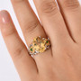 yellow labradorite chrome diopside and zircon flower ring in 18k yellow gold and rhodium over sterling silver worn on a hand