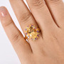 yellow labradorite multi gemstone halo ring in 18k yellow gold over sterling silver worn on a hand