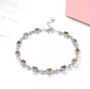 multi tourmaline and white zircon bracelet in rhodium over sterling silver shown in a lifestyle photo