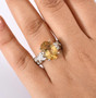 yellow labradorite moissanite vine ring in rhodium over sterling silver worn on a hand
