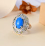 ceruleite and multi gemstone halo cocktail ring in rhodium over sterling silver shown in a lifestyle photo