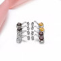 full view of citrine and white zircon dangle earrings in rhodium over sterling silver