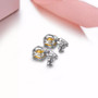 close up of citrine and white zircon dangle earrings in rhodium over sterling silver