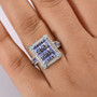 tanzanite paraiba tourmaline and diamond cluster ring in rhodium over sterling silver worn on a hand
