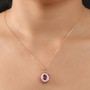 rhodolite garnet and white zircon halo pendant necklace in 18k rose gold over sterling silver worn around the neck