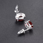 back view of red agate faceted oval halo stud earrings in rhodium over sterling silver