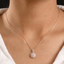 lab pink and white diamond double halo pendant necklace in 18k rose gold over sterling silver worn around the neck