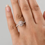 lab pink and white diamond double halo ring in 18k rose gold over sterling silver worn on a hand