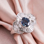 brazilian alexandrite and diamond ring in 900 platinum shown in a lifestyle photo