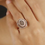 champagne and white diamond cluster ring in 18k rose gold over sterling silver worn on a hand