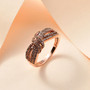 champagne diamond crossover ring in 18k rose gold over sterling silver shown in a lifestyle photo