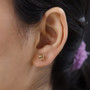 scapolite 5mm round stud earrings in 18k yellow gold over sterling silver worn on the ear