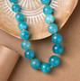 amazonite round graduated beaded necklace in 18k yellow gold over sterling silver 18-20" shown in a lifestyle photo