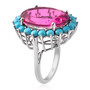 side view of pink quartz triplet and turquoise halo cocktail ring in rhodium over sterling silver