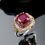 ruby (ff) and multi gemstone regal halo ring in 18k yellow gold and rhodium over sterling silver shown in a lifestyle photo