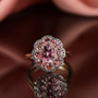 pink blush tourmaline and champagne diamond flower cluster halo ring in 10k rose gold shown in a lifestyle photo