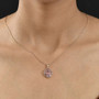 pink blush tourmaline and champagne diamond flower cluster halo pendant necklace in 10k rose gold worn around the neck