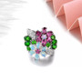 rhodolite garnet opal and chrome diopside floral cluster ring in rhodium over sterling silver shown in a lifestyle photo