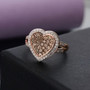 champagne and white diamond ring in 18k rose gold over sterling silver shown in a lifestyle photo