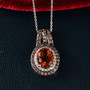 madeira citrine orange sapphire and zircon pendant necklace in rhodium over sterling silver shown in a lifestyle photo