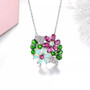 rhodolite garnet opal and chrome diopside floral cluster necklace in rhodium over sterling silver shown in a lifestyle photo