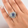 ceylon sapphire paraiba tourmaline and diamond heart triple halo ring in 950 platinum worn on a hand