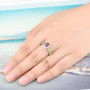 amethyst and peridot ring rhodium over sterling silver worn on a hand