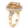 side view of heliodor yellow sapphire and moissanite halo ring in 18k yellow gold over sterling silver