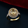 heliodor yellow sapphire and moissanite halo ring in 18k yellow gold over sterling silver shown in a lifestyle photo