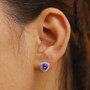 lab color change sapphire and lab diamond trillion halo stud earrings in 10k white gold worn on the ear