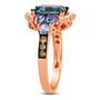 side view of london blue topaz tanzanite and aquamarine ring with white and brown diamonds in 14k rose gold