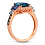 side view of london blue topaz tanzanite and aquamarine ring with white and brown diamonds in 14k rose gold