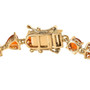 clasp detail of orange kyanite mixed cuts tennis bracelet in 18k yellow gold over sterling silver