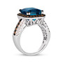 side view of london blue topaz brown and white diamond halo ring in 14k white gold