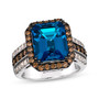front view of london blue topaz brown and white diamond halo ring in 14k white gold