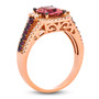 side view of pink tourmaline rhodolite garnet and champagne diamond cushion halo ring in 14k rose gold