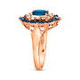 side view of london blue topaz blue sapphire and diamond double halo ring in 14k rose gold